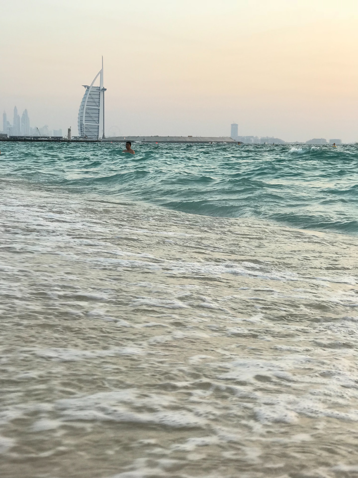 Is Qatar richer than UAE?